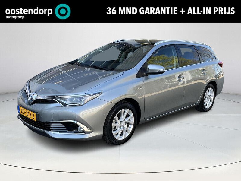 Grijs Gebruikt 2019 Toyota Auris Hybrid Executive Stationwagen | € 21.880 (Iets duurder) - Afbeelding 1/4