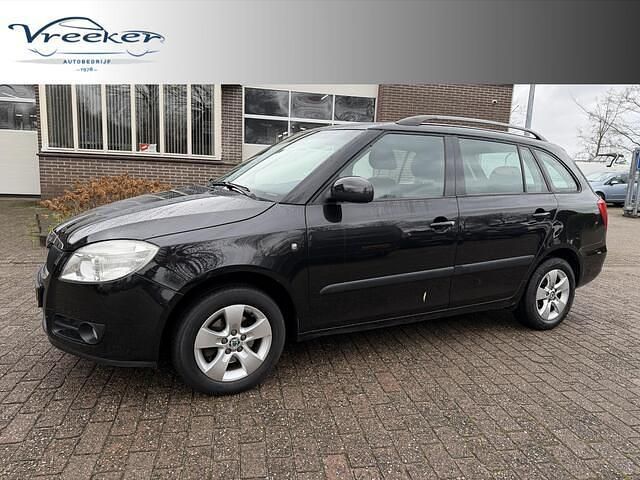Zwart (parellak) Gebruikt 2009 Skoda Fabia Elegance Stationwagen | € 4.945 (Duur) - Afbeelding 1/4