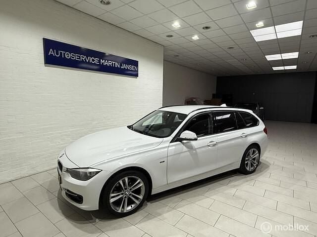 Wit Gebruikt 2014 BMW 316 M Sport Stationwagen | € 7.950 (Iets duurder) - Afbeelding 1/4