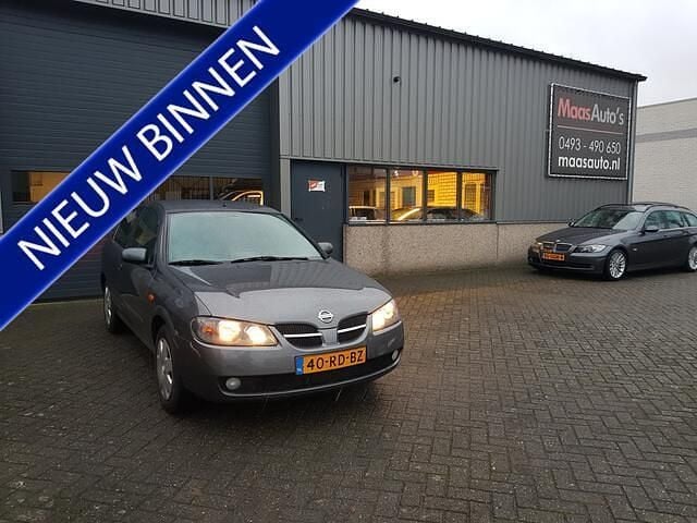Grijs (metallic) Gebruikt 2005 Nissan Almera Acenta Hatchback | € 2.699 (Eerlijke prijs) - Afbeelding 1/4