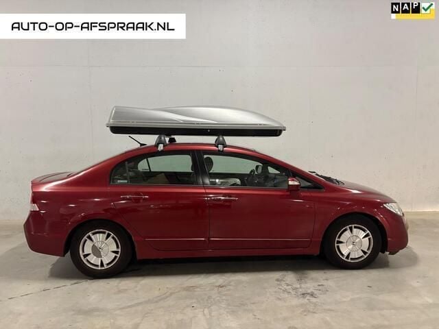 Rood Gebruikt 2006 Honda Civic Hybrid Sedan | € 2.444 (Eerlijke prijs) - Afbeelding 1/4