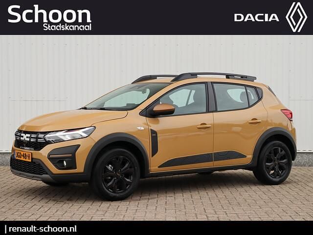 Bruin Nieuw 2025 Dacia Sandero Extreme Hatchback | € 23.595 (Goede deal) - Afbeelding 1/4