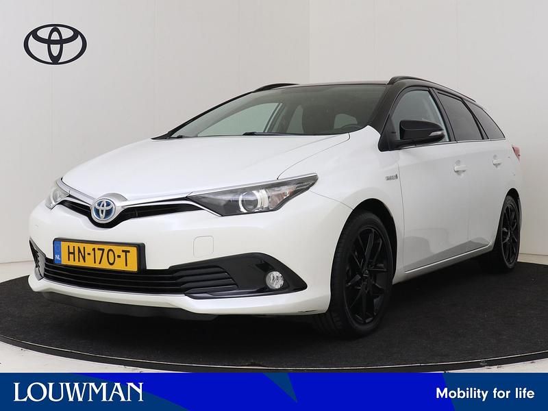 Wit Occasion 2015 Toyota Auris Stationwagen | € 13.400 (Iets duurder) - Afbeelding 1/4
