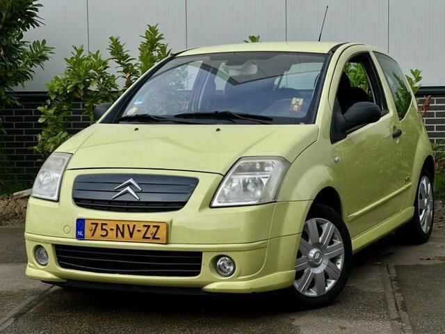 Geel, metallic lak Gebruikt 2004 Citroën C2 VTR Sport Hatchback | € 1.299 (Goede deal) - Afbeelding 1/4