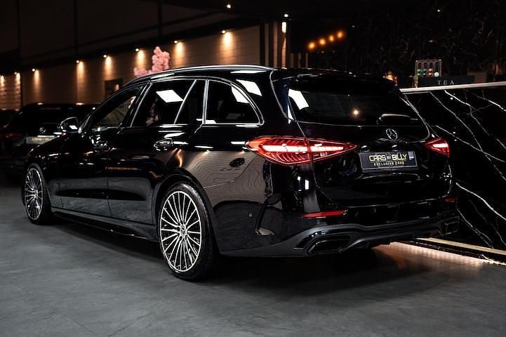 Occasion Mercedes C200 AMG line 204 PK (150 kW) 2022 Zwart Stationwagen