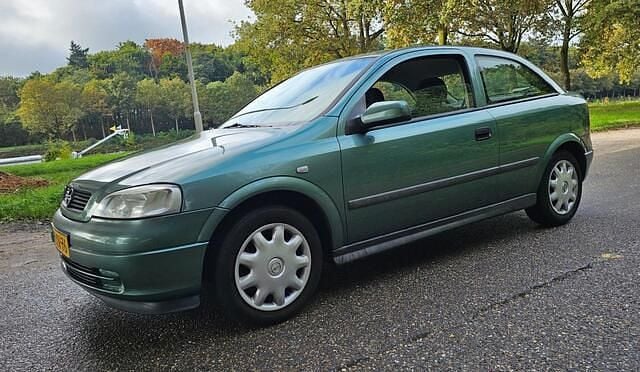 Groen Gebruikt 1999 Opel Astra Hatchback | € 950 (Goede deal) - Afbeelding 1/4