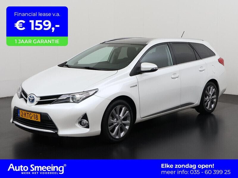 Wit Gebruikt 2013 Toyota Auris Hybrid Stationwagen | € 12.495 (Eerlijke prijs) - Afbeelding 1/4