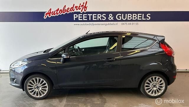 Grijs (metallic) Occasion 2014 Ford Fiesta Hatchback | € 6.745 (Eerlijke prijs) - Afbeelding 1/4