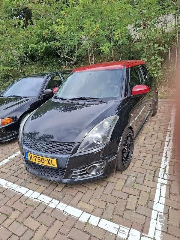 Zwart Gebruikt 2013 Suzuki Swift Sport Hatchback | € 6.750 (Goede deal) - Afbeelding 1/4