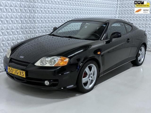Zwart Gebruikt 2002 Hyundai Coupé Coupé | € 2.999 - Afbeelding 1/4
