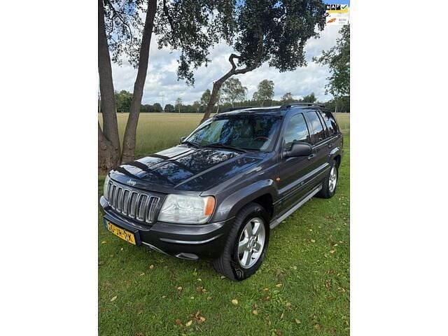 Grijs Gebruikt 2002 Jeep Grand Cherokee Overland SUV | € 5.499 - Afbeelding 1/4