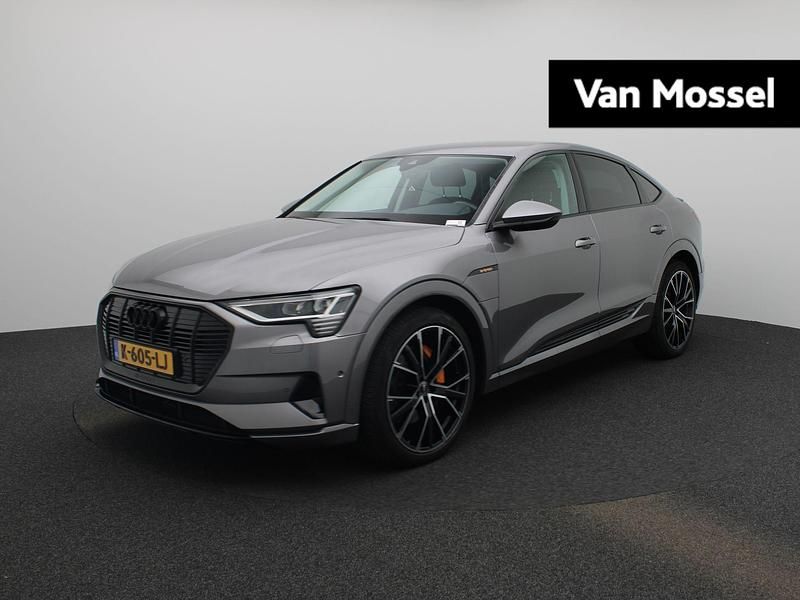 Grijs Gebruikt 2020 Audi e-tron Business SUV | € 30.900 (Eerlijke prijs) - Afbeelding 1/4