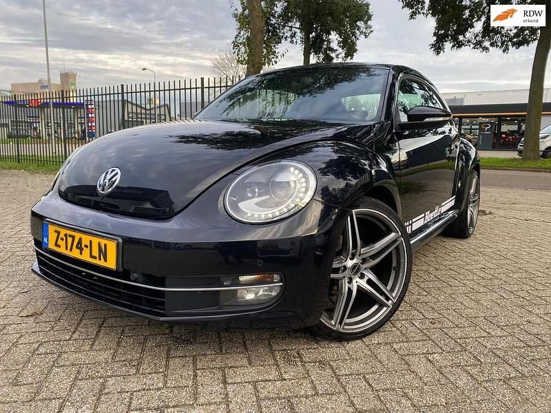 Zwart Gebruikt 2013 VW Beetle Design Hatchback | € 5.995 (Goede deal) - Afbeelding 1/4