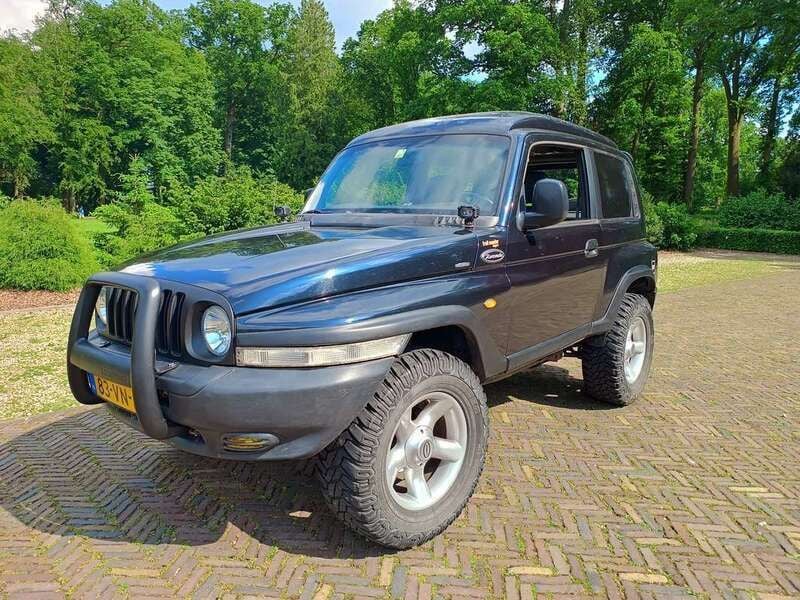 Blauw Gebruikt 2000 Ssangyong Korando SUV | € 6.500 - Afbeelding 1/4