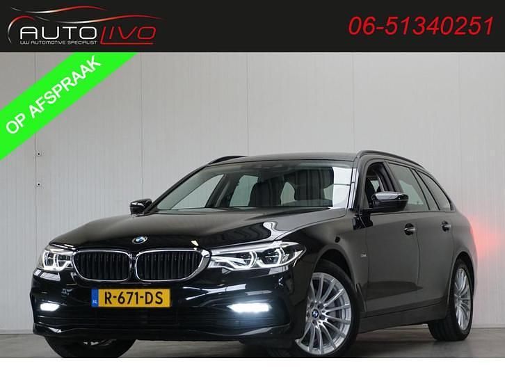 Zwart, metallic lak Occasion 2017 BMW 520 Executive Stationwagen | € 24.895 (Eerlijke prijs) - Afbeelding 1/4
