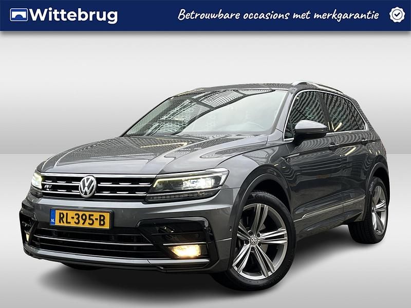 Grijs (metallic) Occasion 2018 VW Tiguan Highline SUV | € 29.950 (Iets duurder) - Afbeelding 1/3