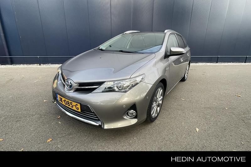 Bruin Gebruikt 2015 Toyota Auris Hybrid Executive Stationwagen | € 15.950 (Iets duurder) - Afbeelding 1/4