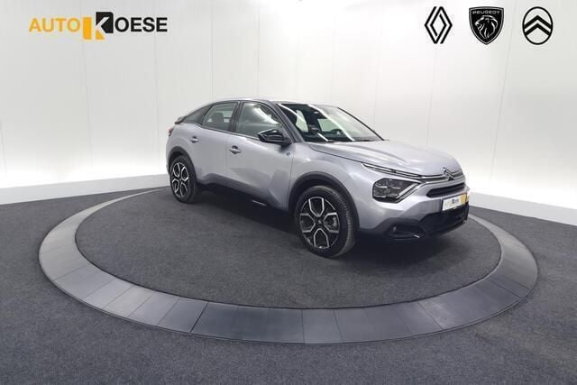 Grijs, metallic lak Gebruikt 2023 Citroën e-C4 Feel SUV | € 18.900 (Eerlijke prijs) - Afbeelding 1/4