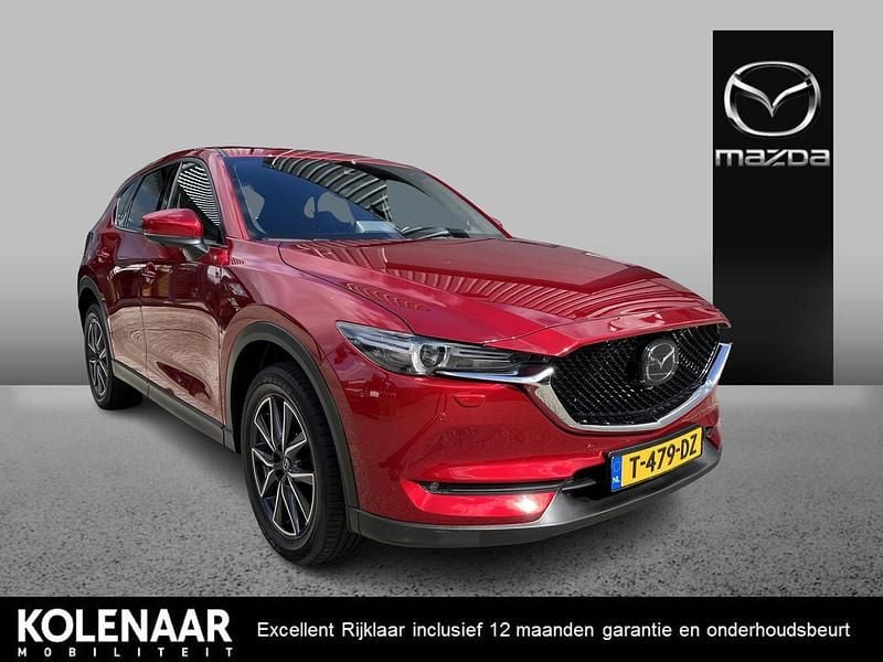 Soul red crystal metallic (46v) Gebruikt 2021 Mazda CX-5 Signature SUV | € 33.895 (Eerlijke prijs) - Afbeelding 1/4