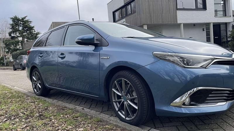 Occasion Toyota Auris Hybrid 136 PK (100 kW) 2015 Blauw Stationwagen