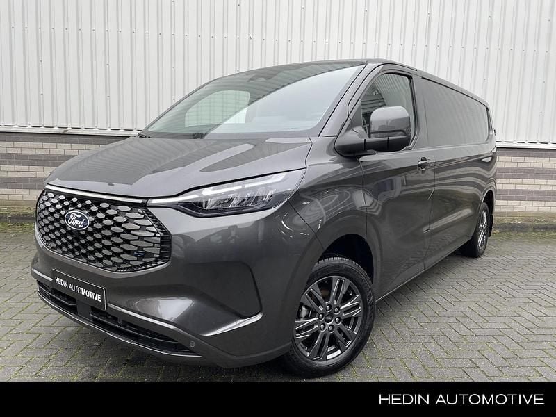 Grijs Nieuw 2024 Ford E-Transit Limited Van | € 46.899 (Eerlijke prijs) - Afbeelding 1/4