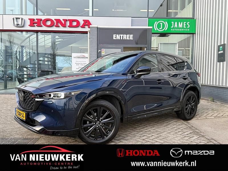 Blauw Gebruikt 2023 Mazda CX-5 Homura-Line SUV | € 34.600 (Goede deal) - Afbeelding 1/4