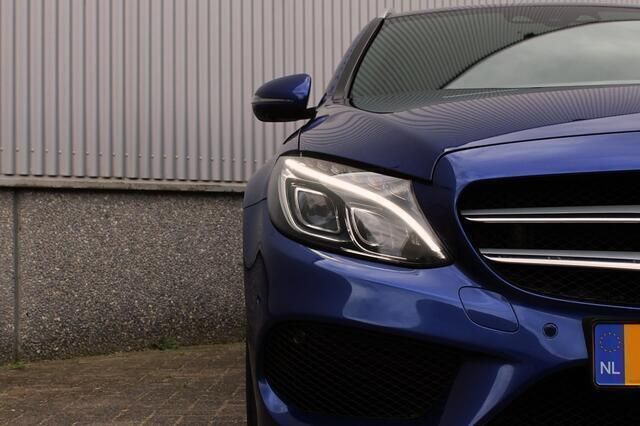 Occasion Mercedes C400 AMG line 333 PK (244 kW) 2015 Blauw, metallic lak Stationwagen