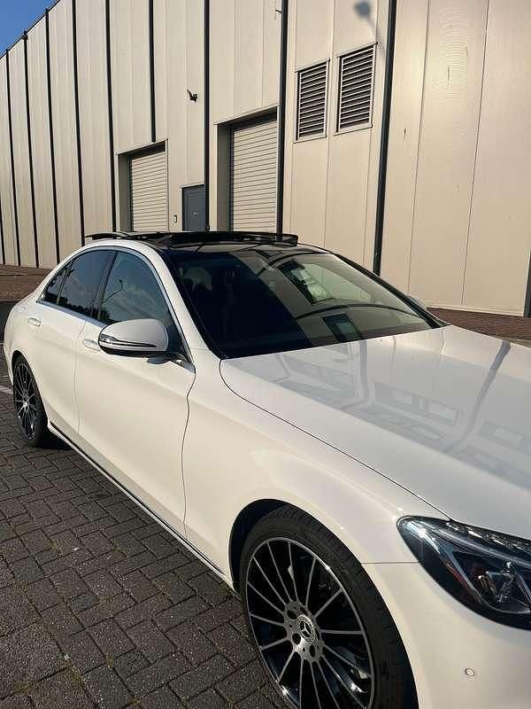 Wit Occasion 2016 Mercedes C180 Ambition Sedan | € 19.500 (Eerlijke prijs) - Afbeelding 1/4