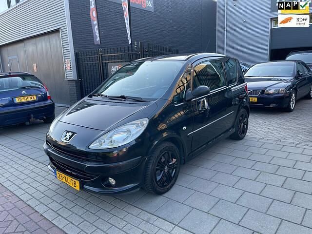 Zwart, metallic lak Occasion 2007 Peugeot 1007 MPV | € 1.499 (Eerlijke prijs) - Afbeelding 1/4