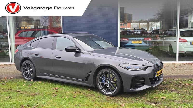 Grijs Gebruikt 2022 BMW i4 Executive Sedan | € 49.450 (Eerlijke prijs) - Afbeelding 1/4