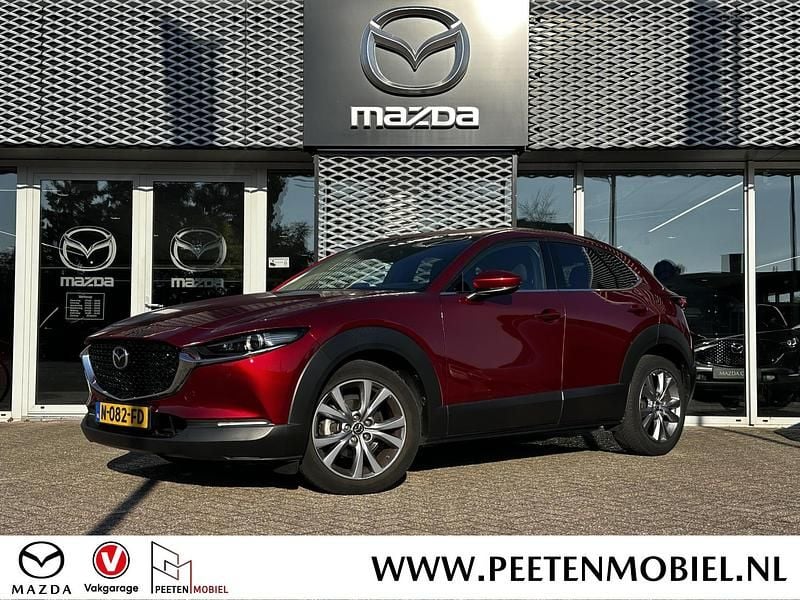 Rood Occasion 2021 Mazda CX-30 Sportive SUV | € 22.095 (Eerlijke prijs) - Afbeelding 1/4