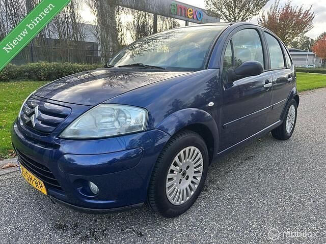 Blauw (metallic) Gebruikt 2006 Citroën C3 Exclusive Hatchback | € 999 (Eerlijke prijs) - Afbeelding 1/4