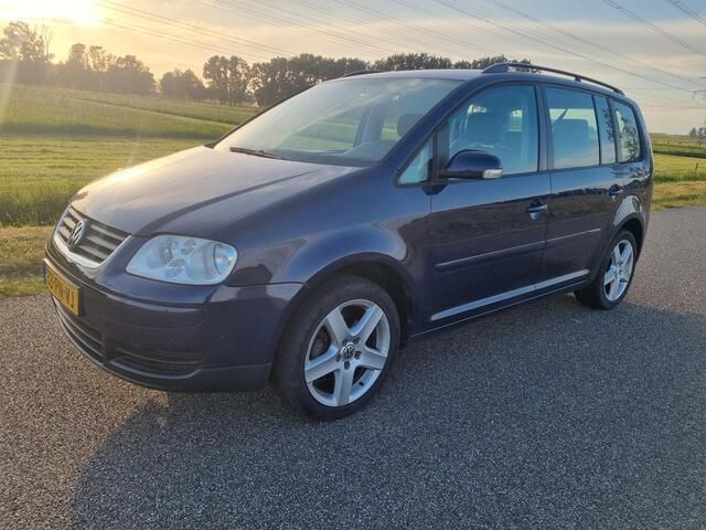 Blauw Gebruikt 2004 VW Touran MPV | € 3.500 - Afbeelding 1/4