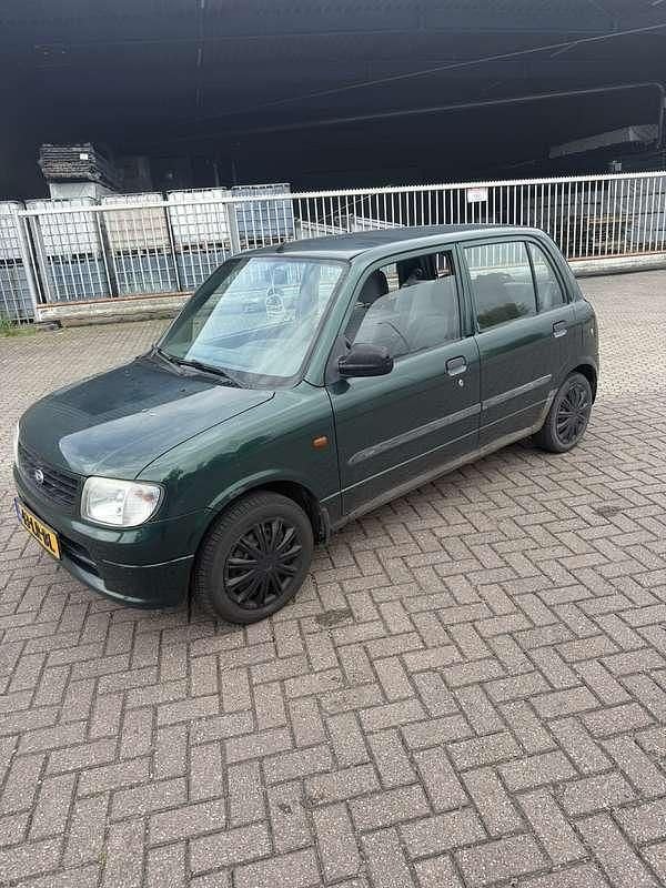 Groen Gebruikt 2003 Daihatsu Cuore Hatchback | € 1.000 (Eerlijke prijs) - Afbeelding 1/4