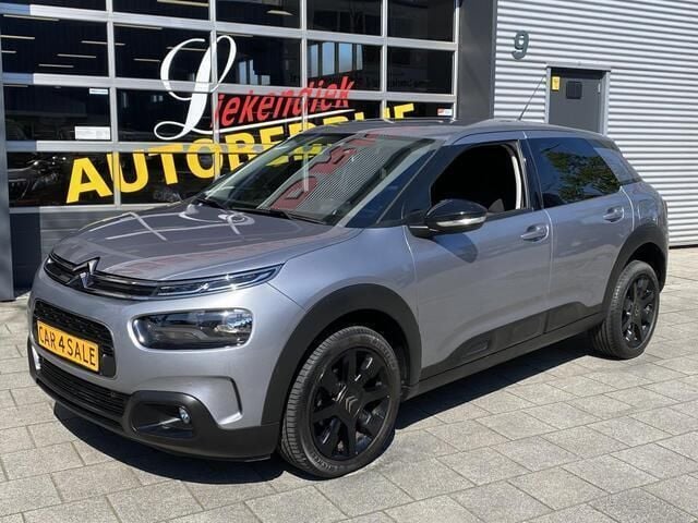 Grijs, metallic lak Gebruikt 2019 Citroën C4 Cactus PureTech Hatchback | € 13.950 (Goede deal) - Afbeelding 1/4