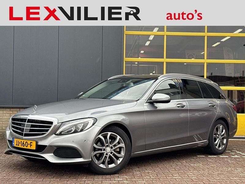 Grijs Occasion 2015 Mercedes C200 Prestige Stationwagen | € 15.950 (Duur) - Afbeelding 1/4
