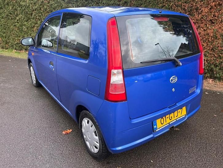 Occasion Daihatsu Cuore 59 PK (43 kW) 2008 Blauw (metallic) Hatchback