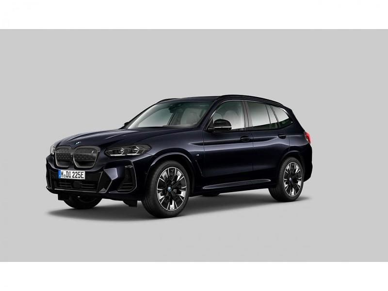 Mcarbonschwarz metallic (donker zwart metallic) Gebruikt 2024 BMW iX3 Comfort Edition SUV | € 52.880 (Goede deal) - Afbeelding 1/3