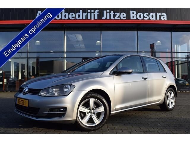 Grijs (metallic) Gebruikt 2013 VW Golf VII Highline Hatchback | € 9.950 (Eerlijke prijs) - Afbeelding 1/4