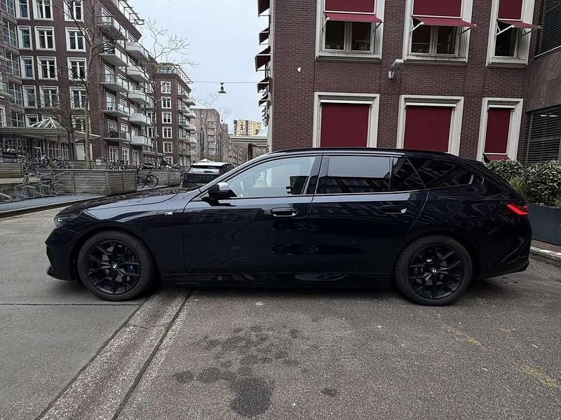 Occasion BMW i5 250 kW (340 PK) 2024 Zwart Stationwagen