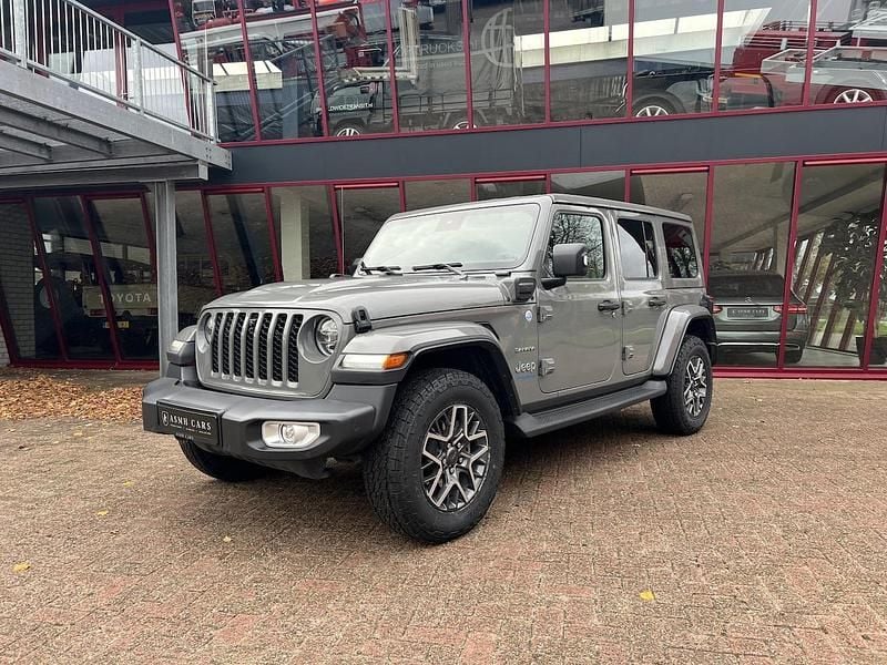 Grijs Gebruikt 2023 Jeep Wrangler Unlimited Sahara SUV | € 62.950 (Eerlijke prijs) - Afbeelding 1/4