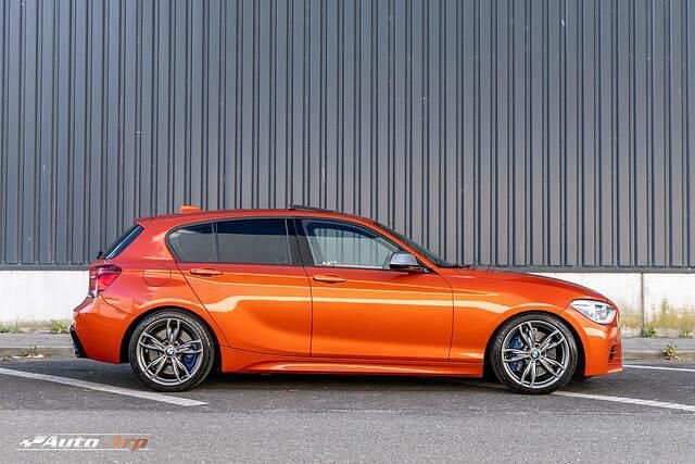 Occasion BMW M135 Executive 320 PK (235 kW) 2013 Oranje Hatchback
