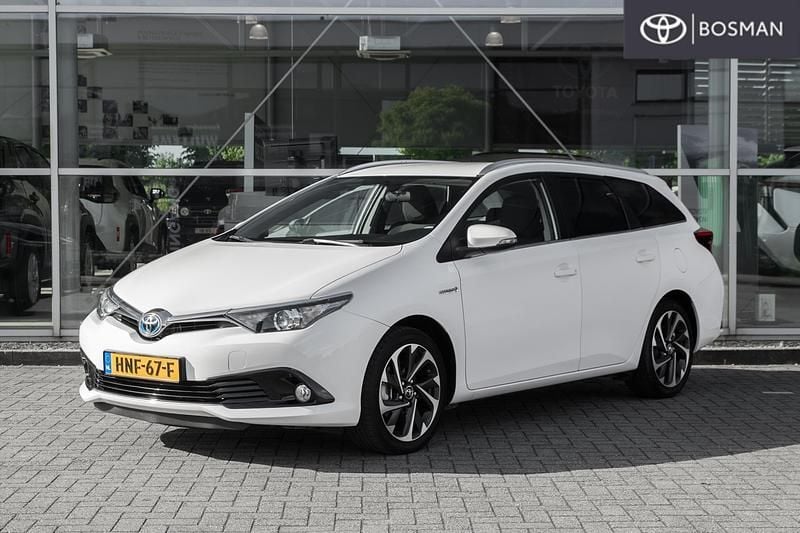 Wit Gebruikt 2016 Toyota Auris Hybrid Stationwagen | € 17.549 (Eerlijke prijs) - Afbeelding 1/4