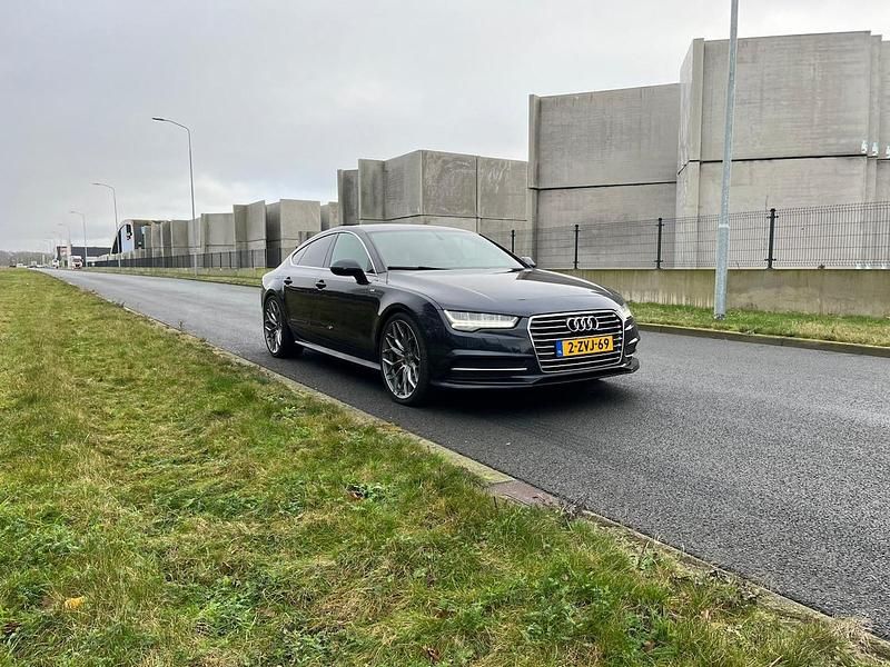 Blauw (metallic) Gebruikt 2015 Audi A7 Sportback S-Line Hatchback | € 20.750 (Super prijs) - Afbeelding 1/4