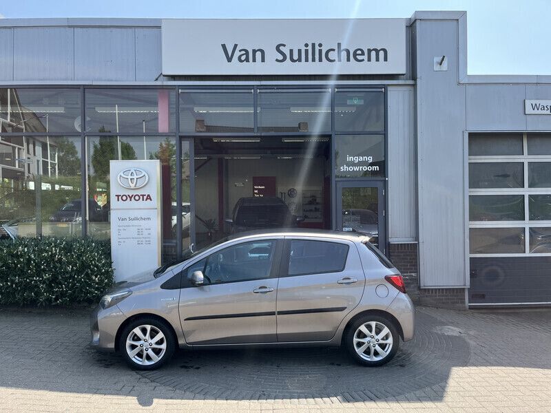 Bruin Gebruikt 2015 Toyota Yaris Hybrid Hatchback | € 12.995 (Eerlijke prijs) - Afbeelding 1/4