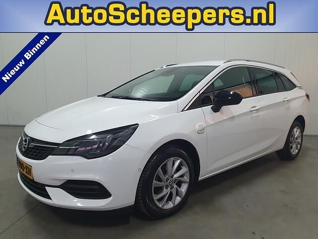 Wit Occasion 2021 Opel Astra Elegance Stationwagen | € 8.995 - Afbeelding 1/4