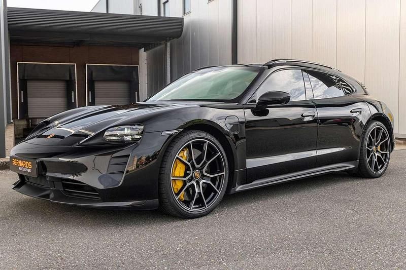 Zwart Gebruikt 2023 Porsche Taycan Sport Turismo Sedan | € 114.950 - Afbeelding 1/4