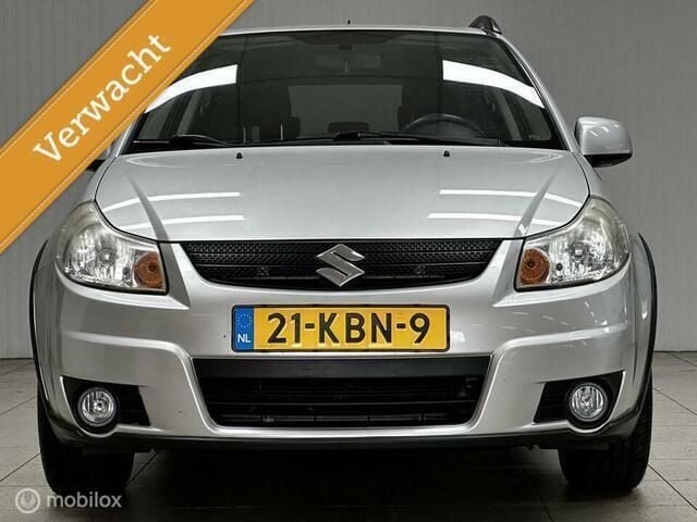 Grijs Gebruikt 2009 Suzuki SX4 MPV | € 5.495 (Eerlijke prijs) - Afbeelding 1/4