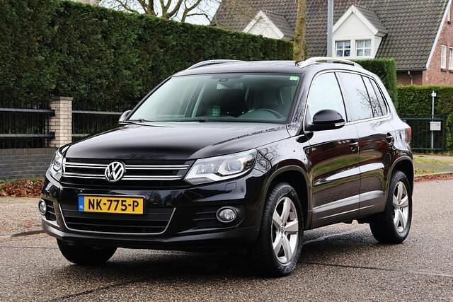 Zwart Gebruikt 2012 VW Tiguan Sport SUV | € 10.945 (Eerlijke prijs) - Afbeelding 1/4