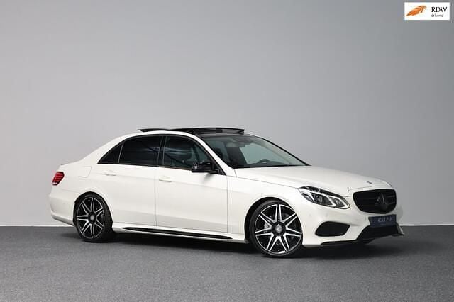 Wit Gebruikt 2015 Mercedes E400 AMG Sedan | € 29.995 - Afbeelding 1/4